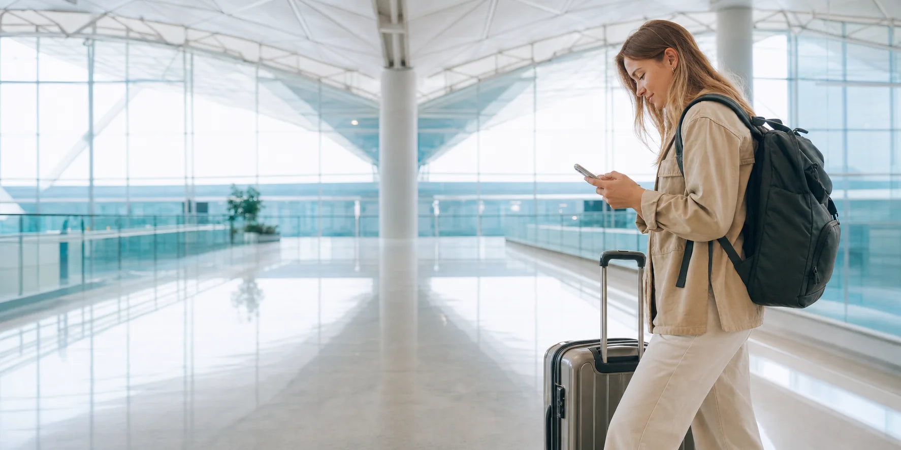 International traveler using her phone after arriving in China